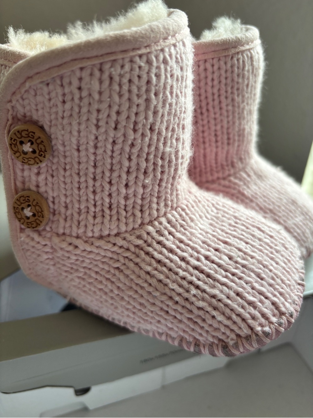 UGG Kids Light Pink Knit Bootie Slippers with Button Detail